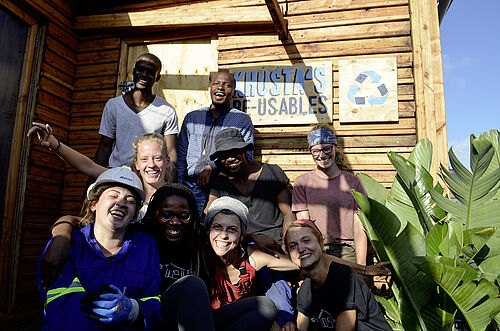 The group of exchange students in front of Khusta's Workshop